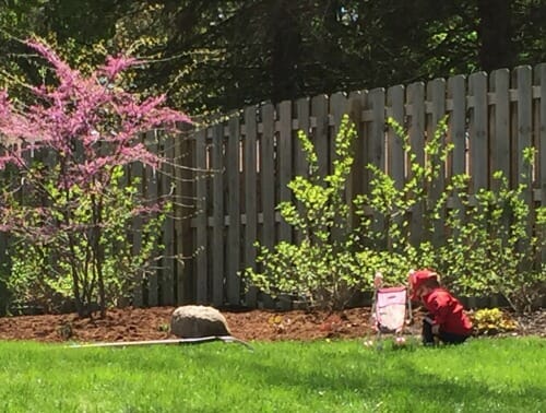 simon picking flowers