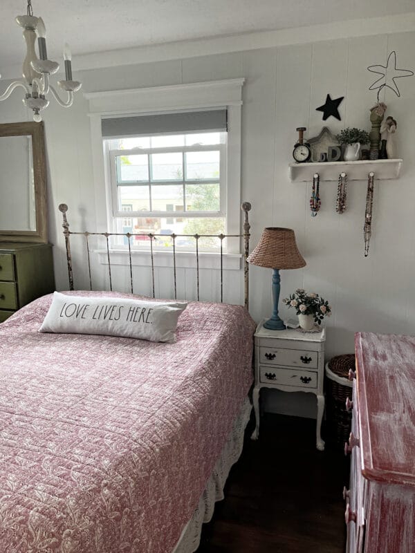 farmhouse bedroom with iron bed