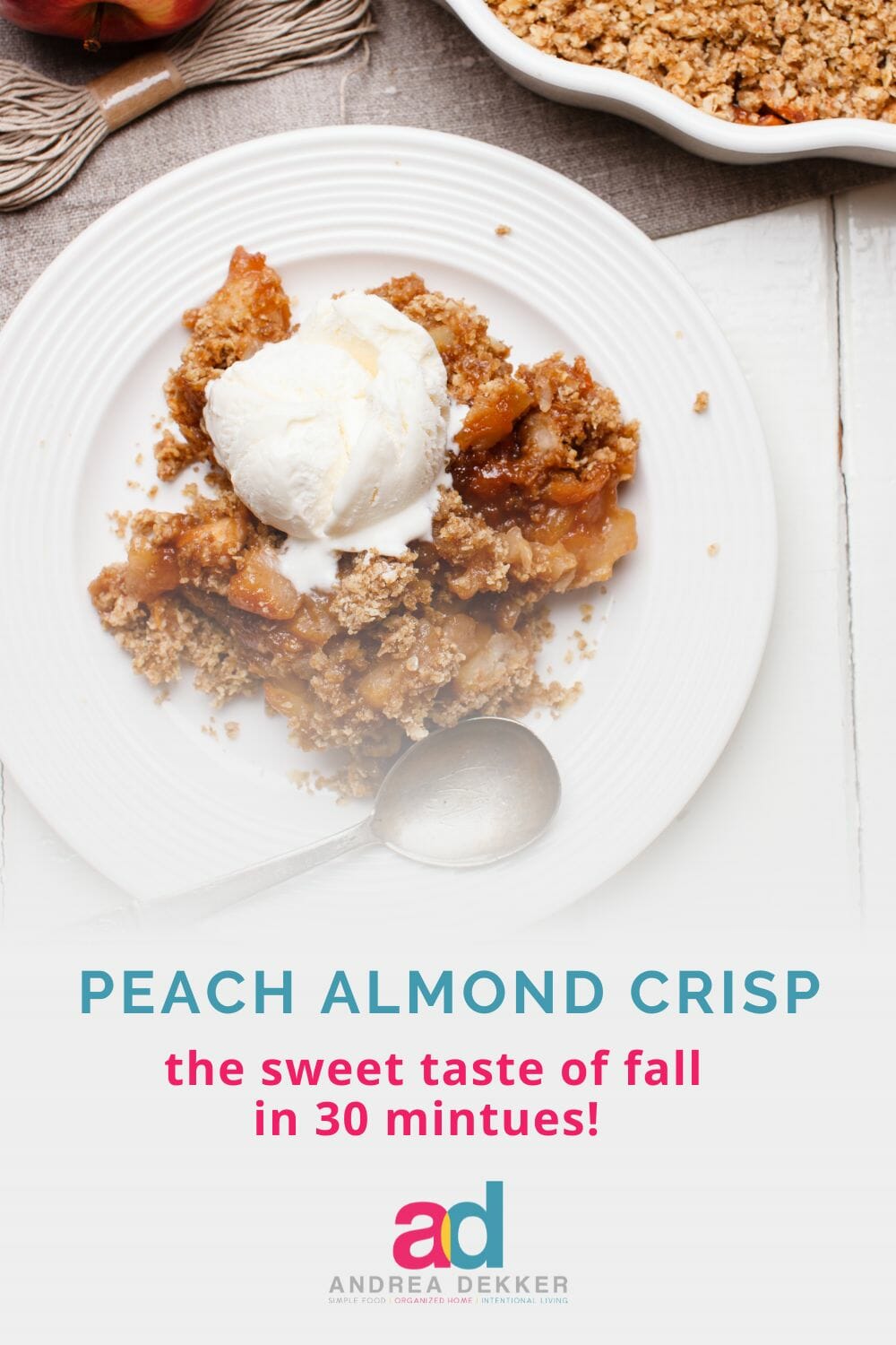Peach almond crisp is my family's favorite peach dessert. I hope your family enjoys this simple, sweet taste of fall around your kitchen table too! via @andreadekker