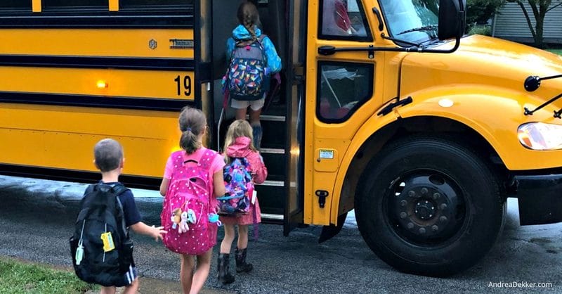 kids getting on the bus